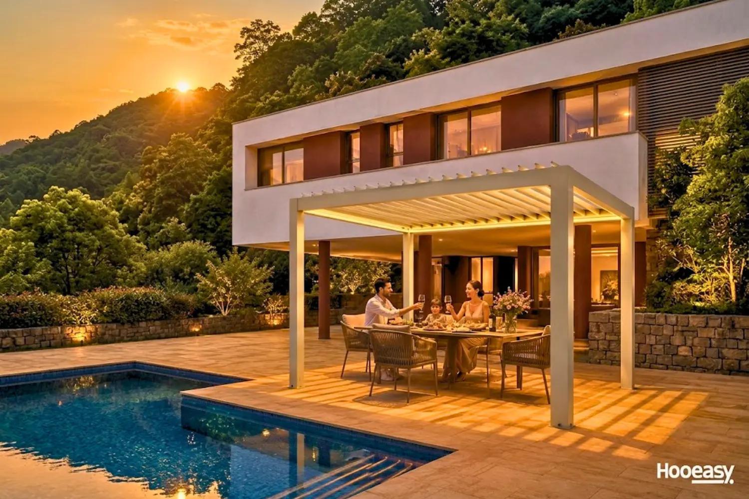 Heatwaves Are a Health Crisis: Why Shade Is Becoming Essential Outdoor Infrastructure 4 Family dining under a modern louvered pergola in a residential garden with adjustable shade providing heatwave protection and comfortable outdoor liv